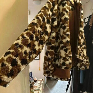 Ugg Olympia Fleece Cropped Jacket with Hood in Cow Print (white, black, & brown)